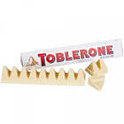 Швейцарський білий шоколад Toblerone з родзинками, нугою з меду і мигдальним горіхом, 100 г, фото 2