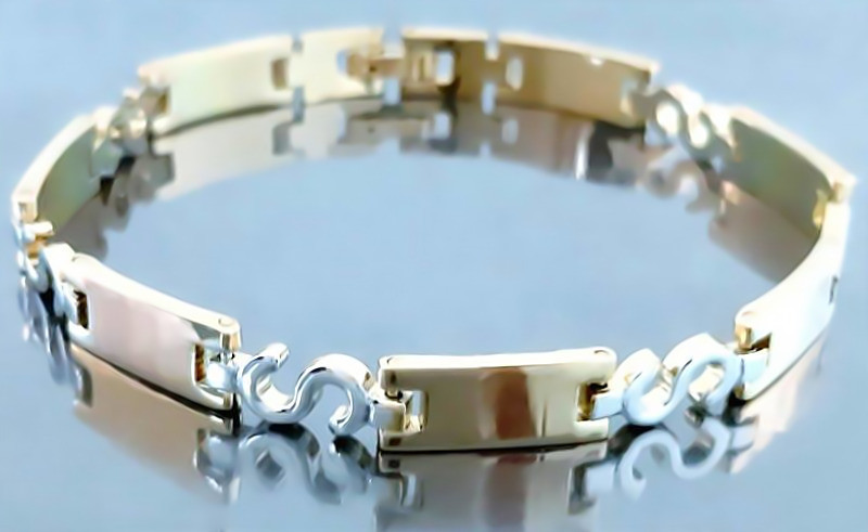 Браслет Аthena зі сталі. Позолота з лимонним відтінком + родій. Довжина: 21 см. Ширина: 7 мм.