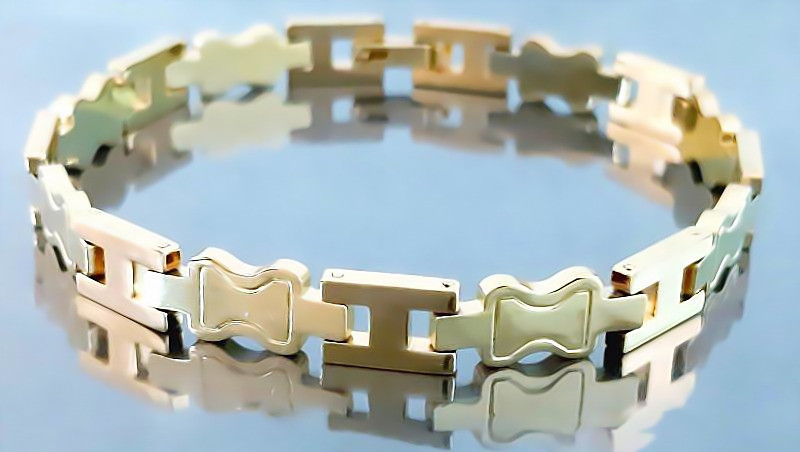 Браслет Аthena зі сталі. Позолота з лимонним відтінком. Довжина: 19 см. Ширина: 7 мм.