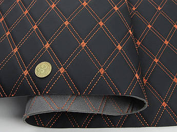 Чорний Шкірзам (прошитий помаранчевої ниткою) для автомобілів, поролон з сіткою. «Ромб подвійний» шир 1,45 м