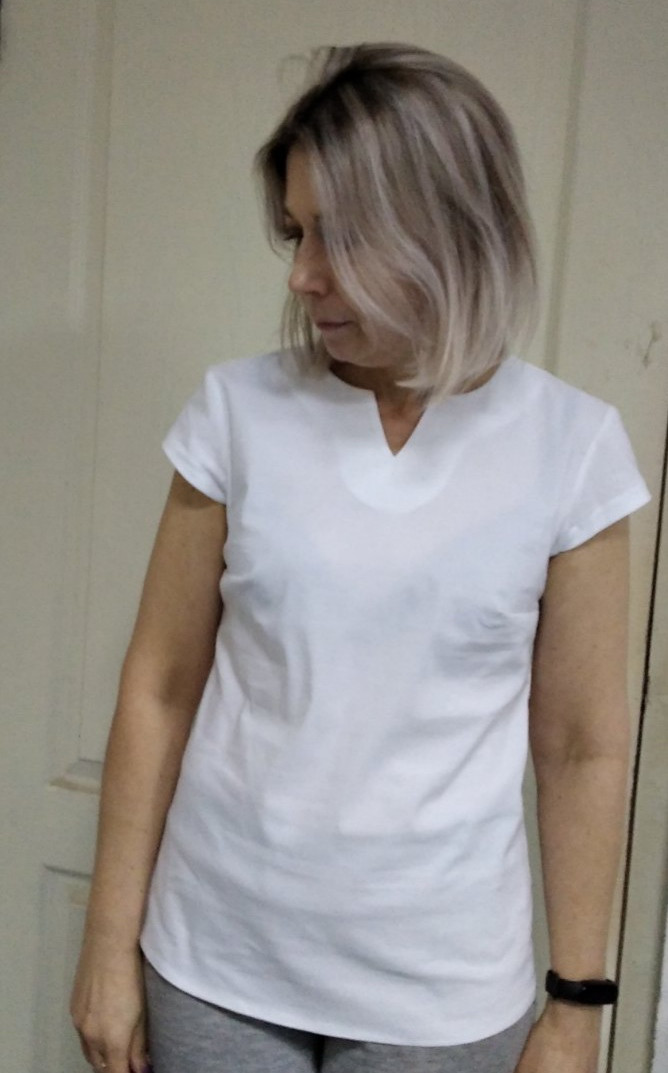 Біла блуза