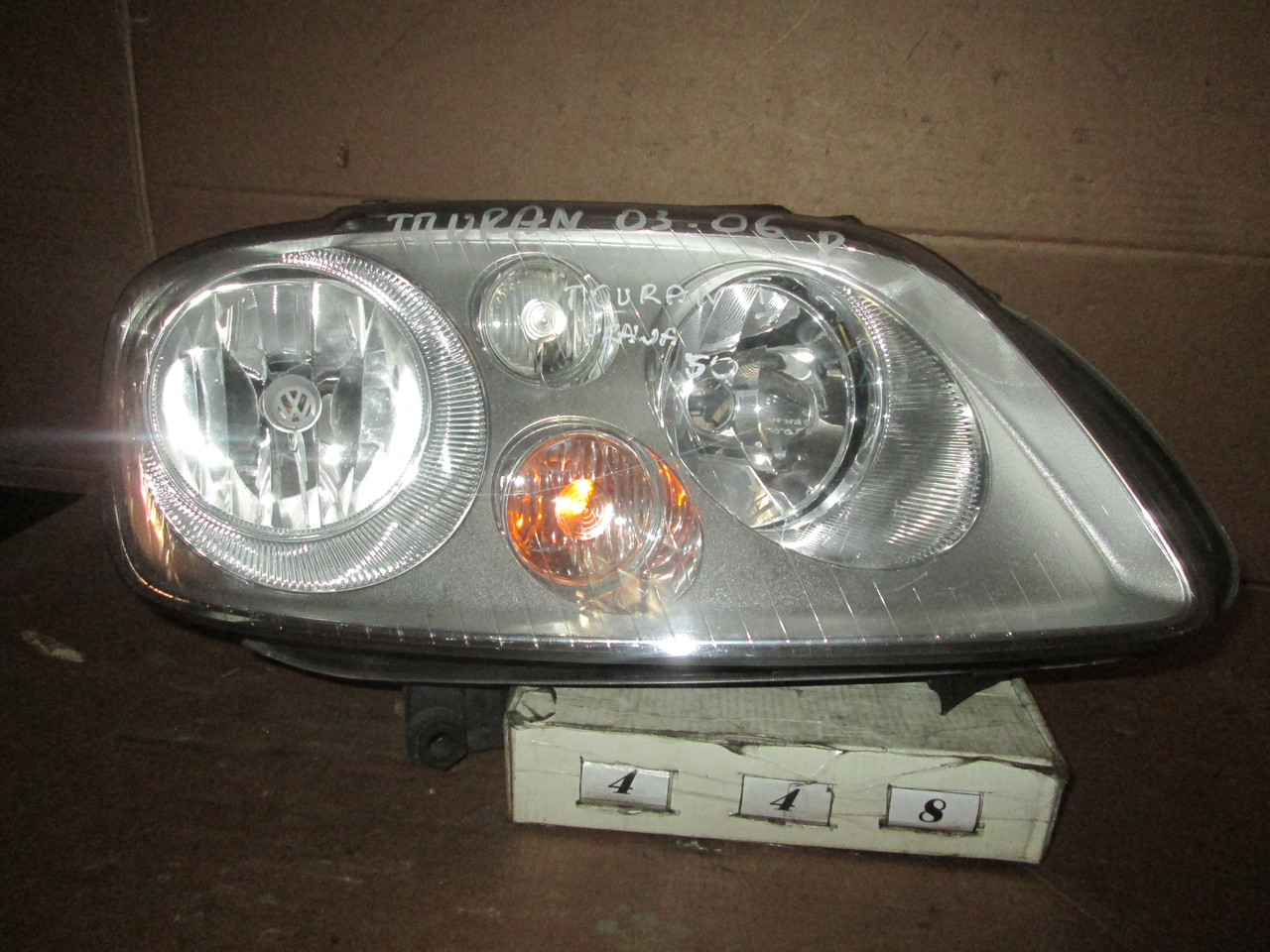 No448 Б/у Фара права 1T0941006R для Volkswagen Touran 2003-2006 Дефект