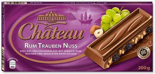 Молочний шоколад з родзинками і подрібненим лісовим горіхом Chateau Rum Trauben Nuss 200гр. Німеччина