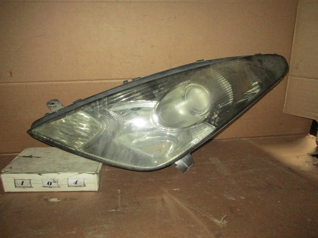 No104 Б/у Фара ліва 811702B750 для Toyota Celica 1999-2005, фото 1