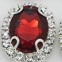 Камінь в сріблястій оправі 2*1,5 см бордовий