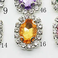 Камінь в сріблястій оправі 2*1,5 см жовтий