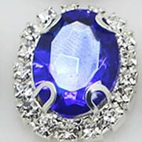 Камінь в сріблястій оправі 2*1,5 см електрик