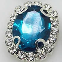 Камінь в сріблястій оправі 2*1,5 см темна бірюза