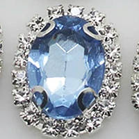 Камінь в сріблястій оправі 2*1,5 см світло-синій