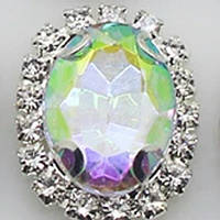 Камінь в сріблястій оправі 2*1,5 см хамелеон