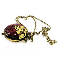 Бронзовий аромакулон на ланцюжку з коралом