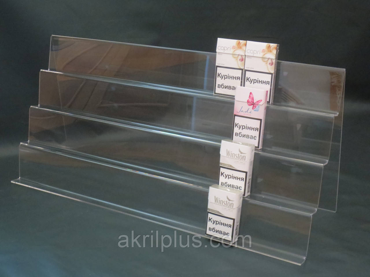 Акрилова горка на три сходи під пачки цигарок на вітрину магазину