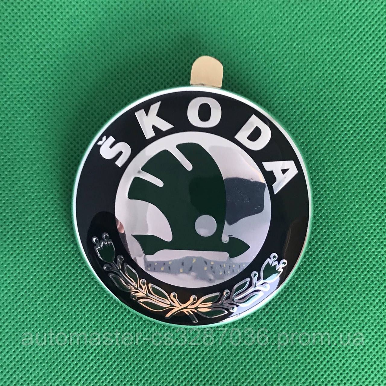 Эмблема Skoda/Шкода на капот/багажник 79 мм, темно-зеленая, 1U0 853 621c