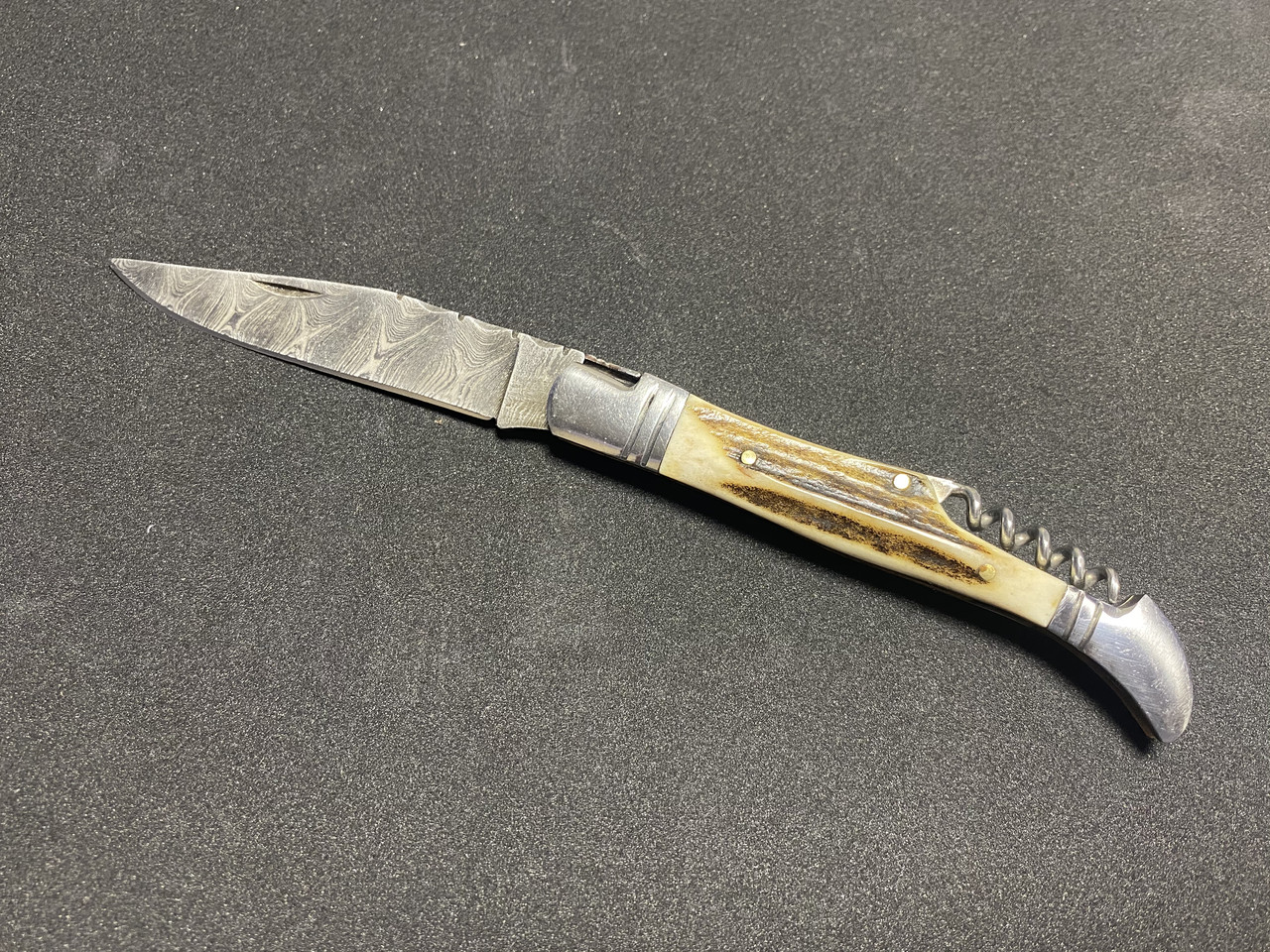 Складаний ніж із дамаської сталі із штопором "Ріг оленя"