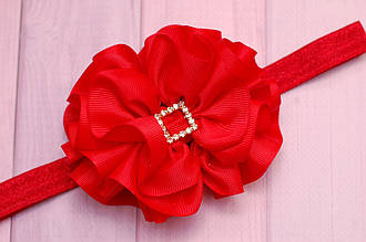 Пов'язка дитяча на голову для дівчинки червона з об'ємним бантом на стрейтчевой основі