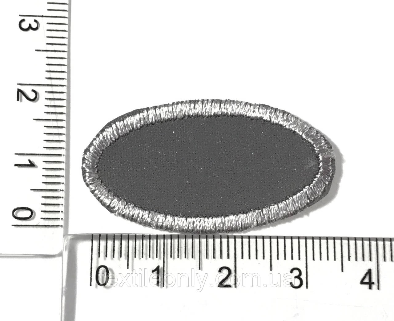 Нашивка Овал Світловідбивний 35х19 мм