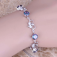 Жіночий срібний браслет на руку з містик топазом