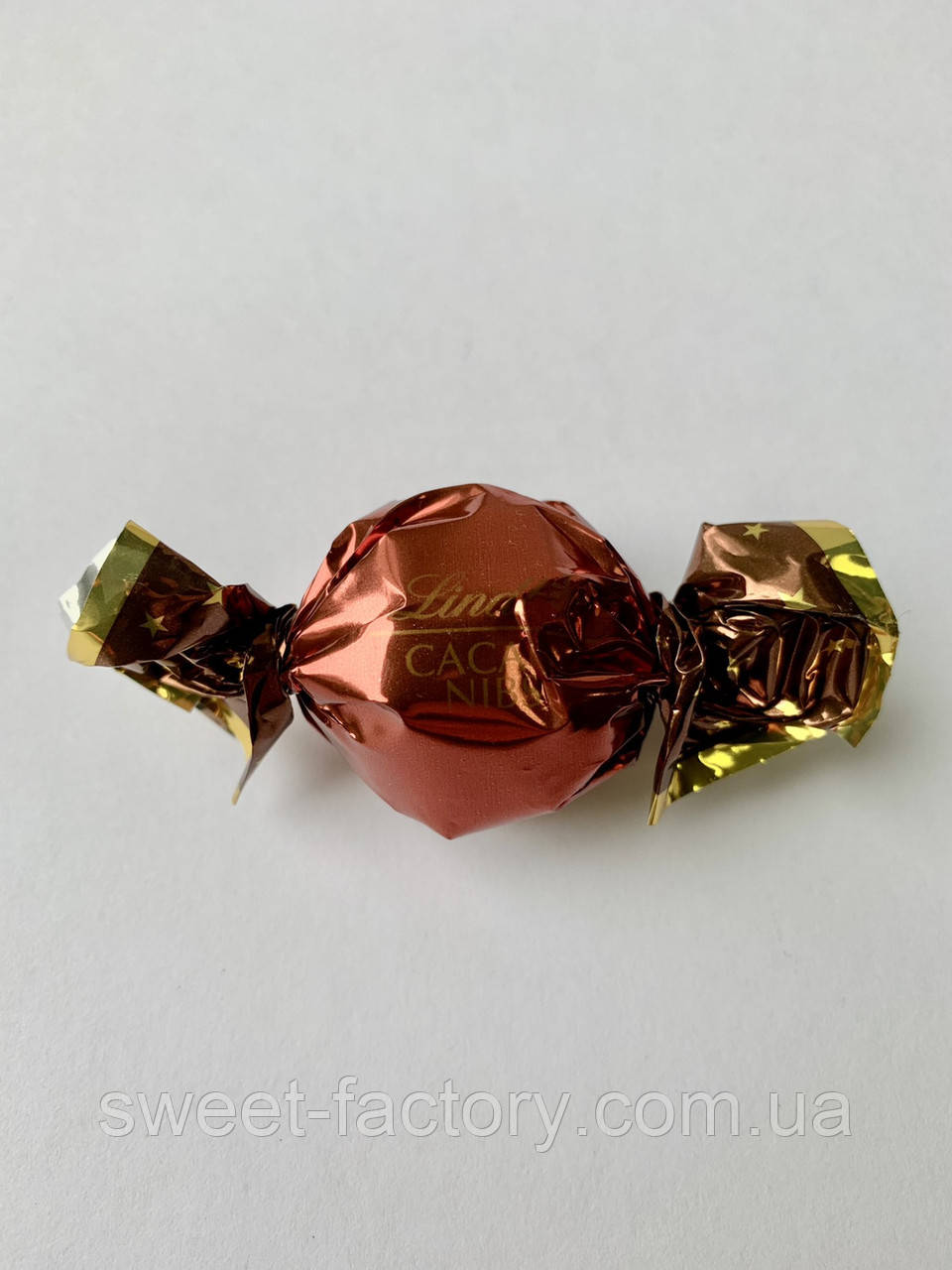Цукерка Lindt Lindor Dunkle Cacao Nibs
