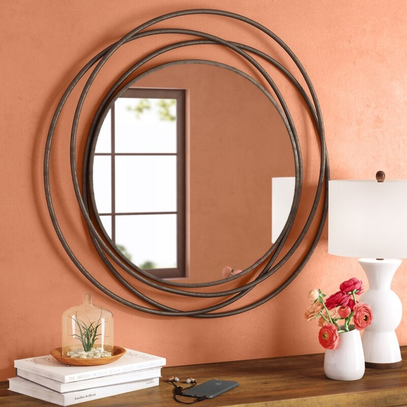 Дизайнерське кругле дзеркало лофт із металу