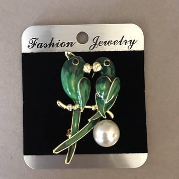 Брошка "Парочка папуг" 5,5х2см зелена емаль, жовтий метал