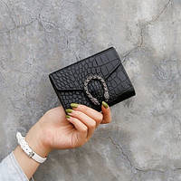 Жіночий класичний гаманець рептилія з підковою чорний