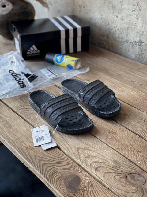 Adidas boost slides triple black deals