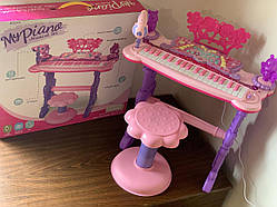 Дитяче піаніно синтезатор зі стільчиком 6618 рожевий для дівчинки