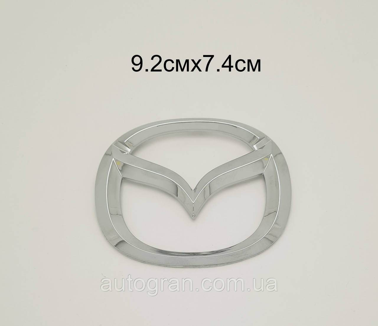 Емблема решітки радіатора та кришки багажника Mazda 9.2 смх7.4 см