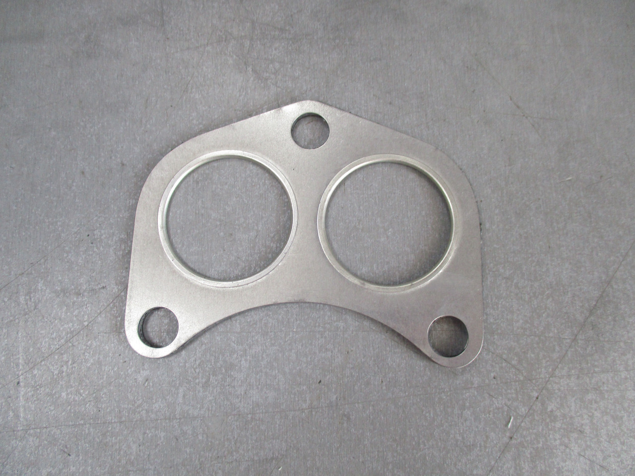 Прокладка приймальної труби Fa1 130-902 FORD OHC, CVH