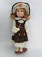 Кукла Колекційна лялька порцелянової 32 см У капелюсі з цвітиком