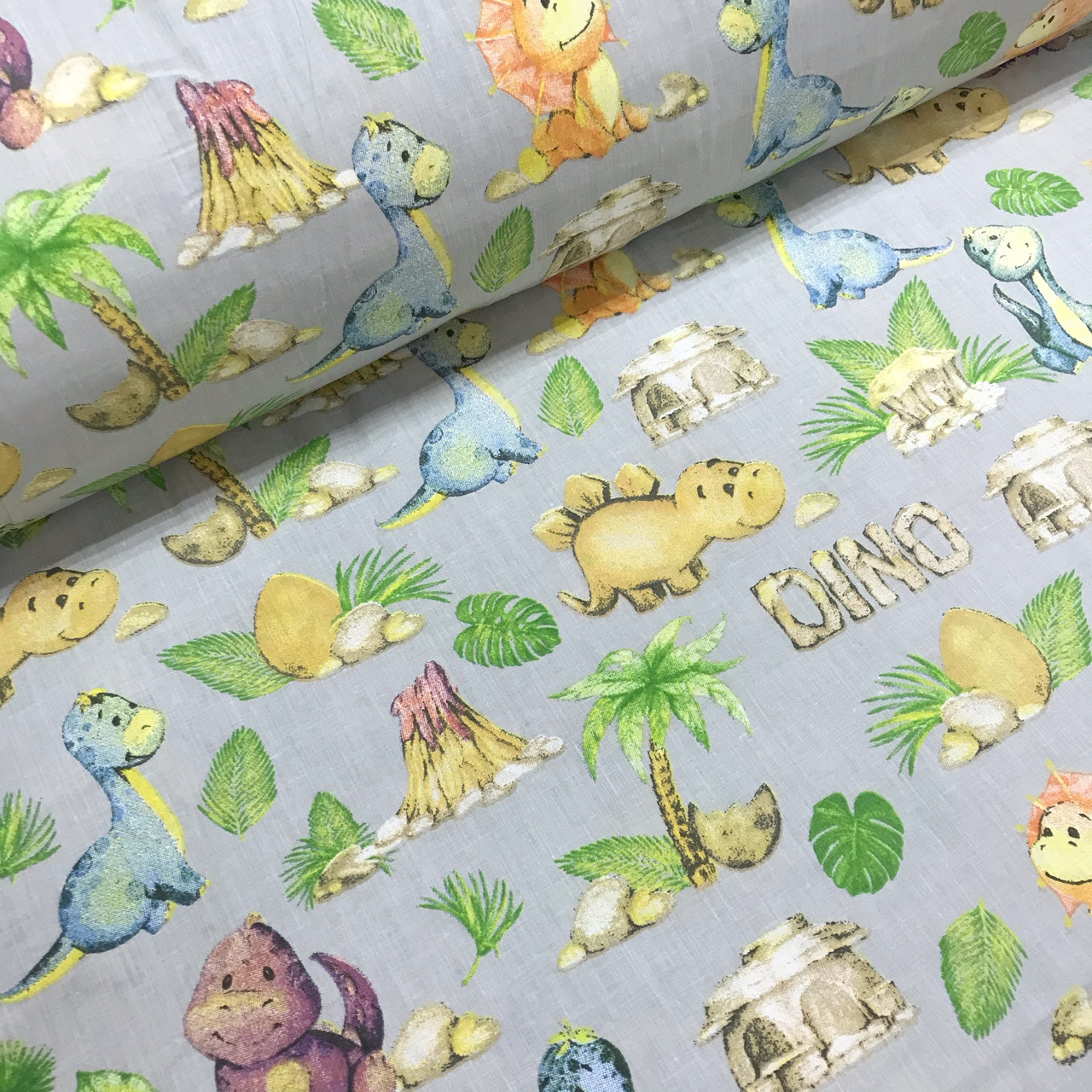 Бавовняна тканина Польська, динозаври "dino" з вулканами та пальмами на сірому (0007)