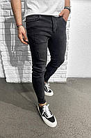 Мужские джинсовые штаны черного цвета (черные) зауженные с потертостями и молнией внизу Турция
