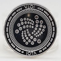 Монета сувенирная IOTA серебряного цвета.