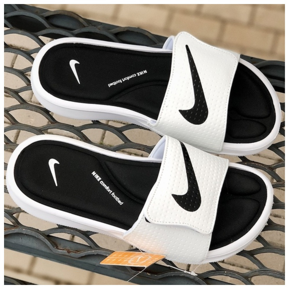 Чоловічі шльопанці Nike, чорно-білі шкіряні шльопки найк чорні сланці сліпони тапки
