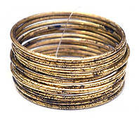 Комплект из 12 браслетов кольцо Дутые желтый метал d = 7 см.