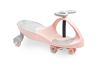 Машинка для катания инерционная Caretero Spinner Pink со световыми эффектами колес