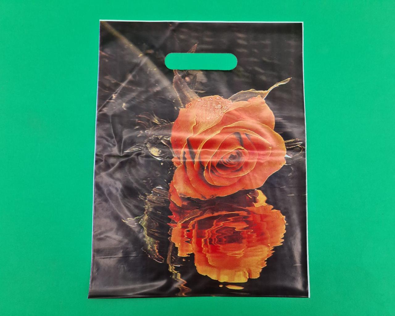 Пакети з вирубний ручкою (25*35+3)"Троянда" ХВГ (25 шт)