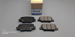 Колодки задні гальмові дискові оригінал MAZDA GHY92648ZC