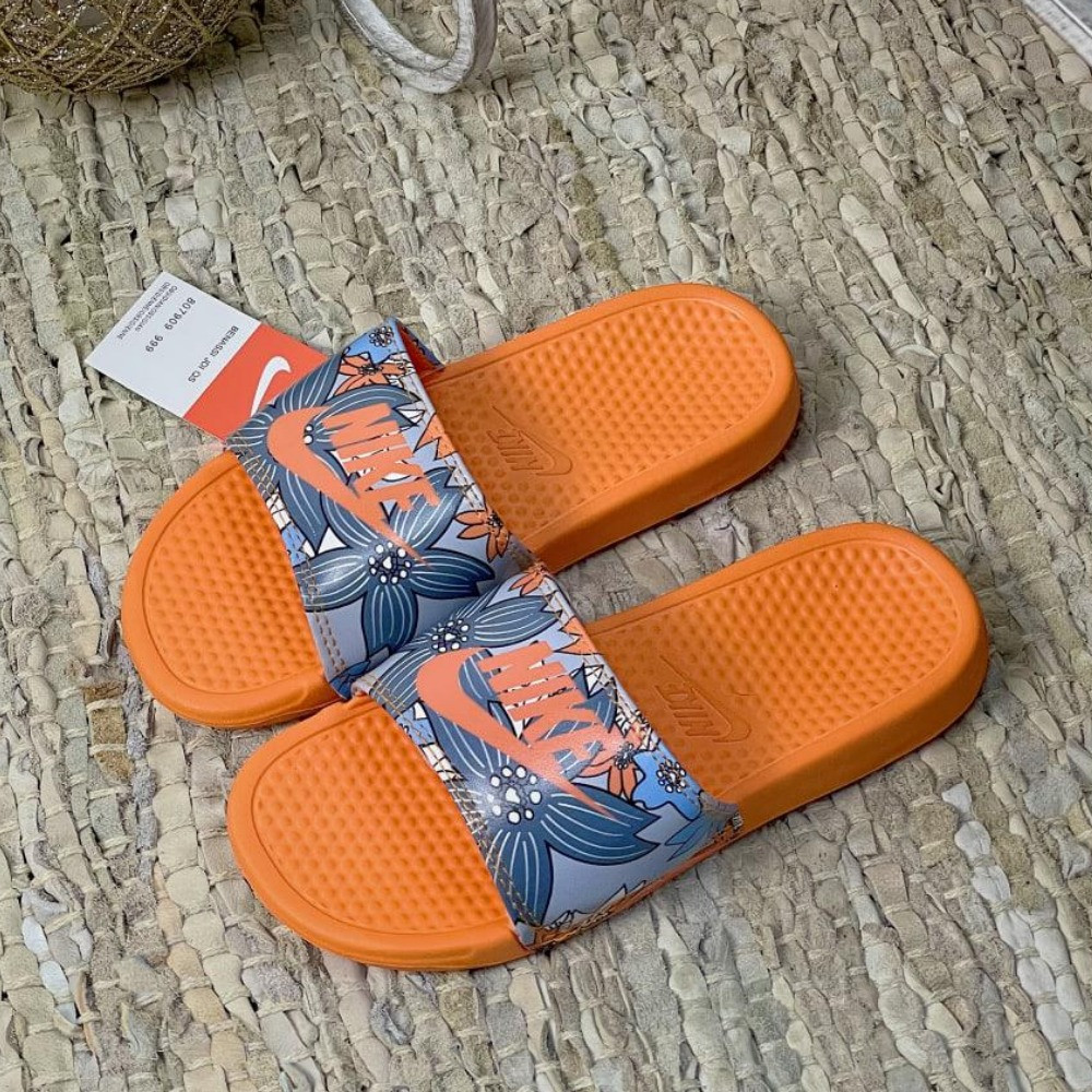 Жіночі шльопанці Nike помаранчеві шкіряні шльопанці найк сланці