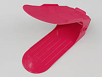 Двойная подставка-органайзер для обуви розового цвета. Регулируется по высоте в 3 положениях.