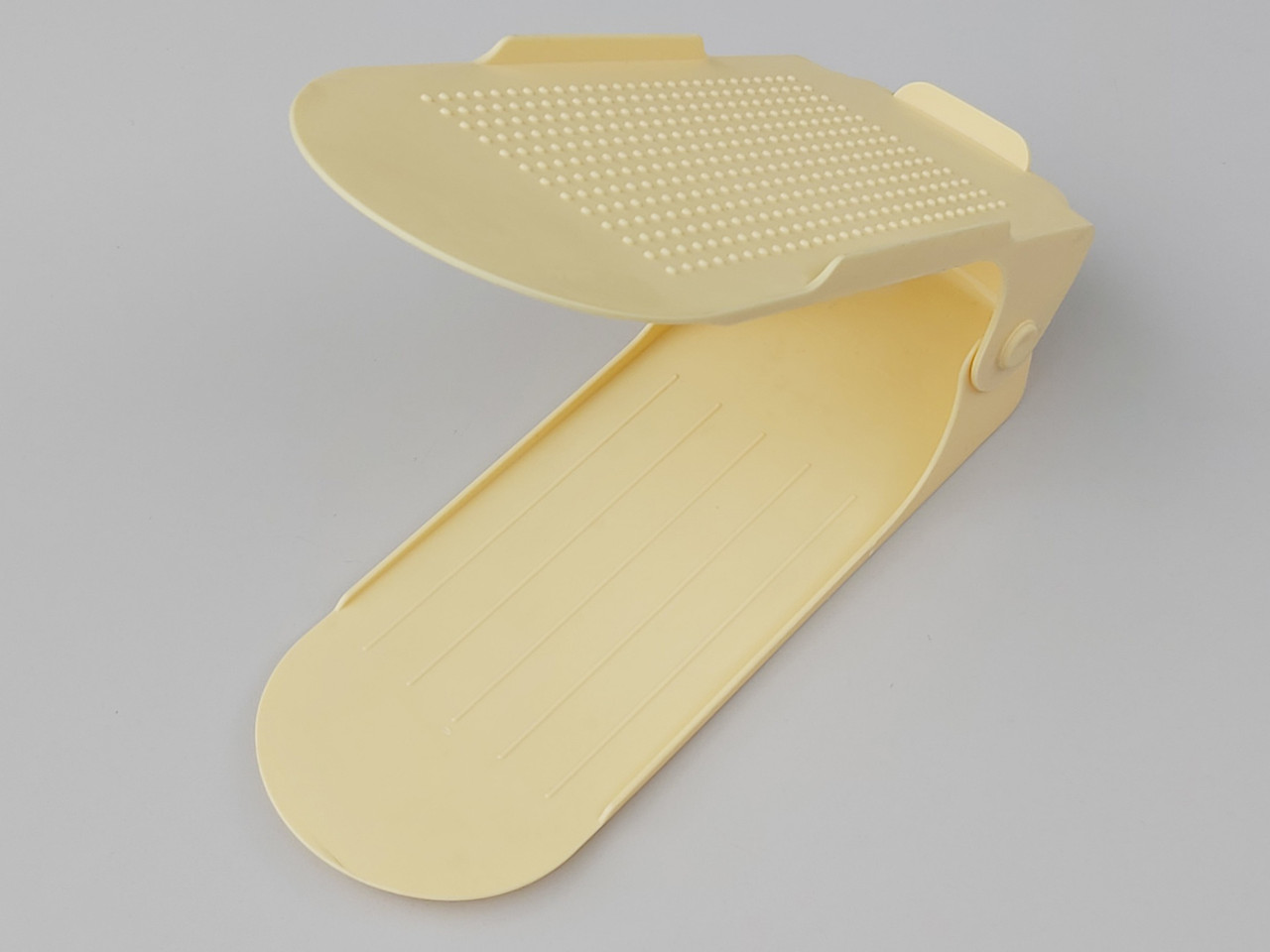 Подвійна підставка-органайзер для взуття бежевого кольору. Регулюється по висоті в 3 положеннях.