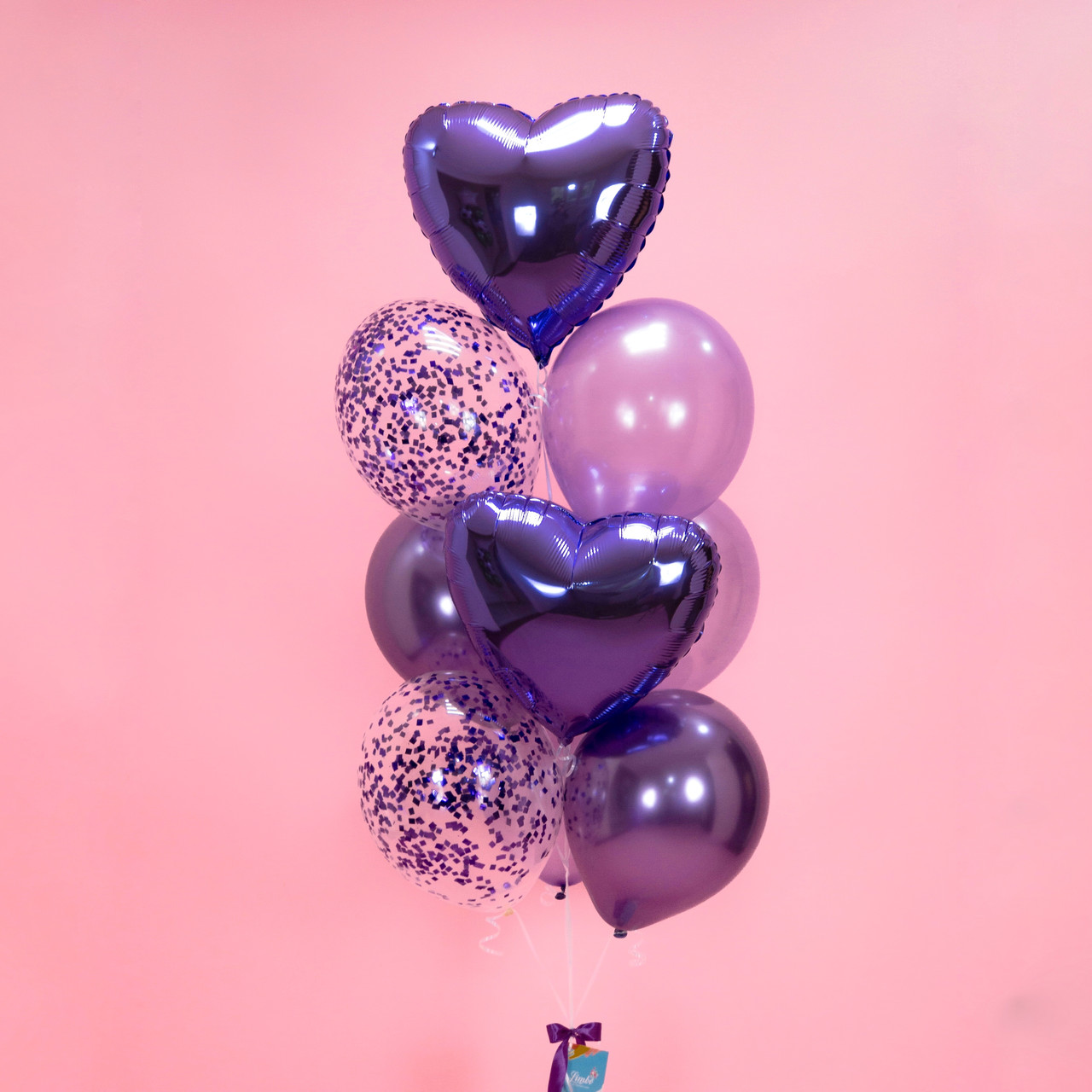 Композиції з повітряних куль на день народження у фіолетовому кольорі і кулі сердечка