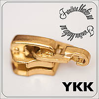 Бегунок для металлической молнии №5 YKK золотого цвета усиленный (карабин)