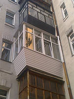 Остекление балкона в квартире с высокими потолками