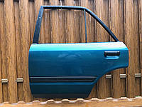 Дверь задняя левая Mazda 323 BG седан 1989 - 1994 гв.