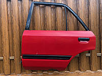 Дверь задняя левая Mazda 323 BG седан 1989 - 1994 гв.