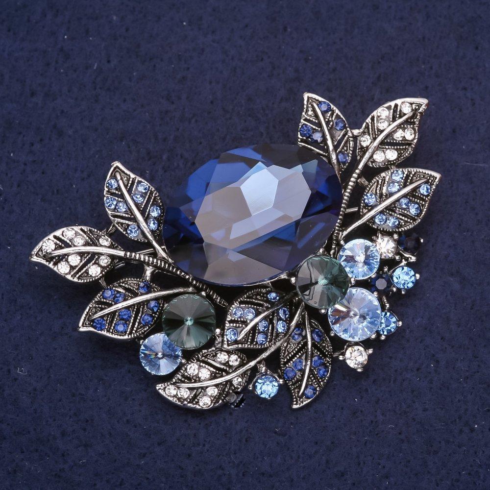 Брошка велика Акцент в рослинному дизайні зі стразами і каменем колір синій 67х45мм сріблястий метал, фото 1