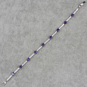Браслет жіночий тонкий застібка-карабін сріблястого кольору з фіолетовими і білими стразами розмір 18 см