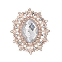 Камінь в ажурній золотистій оправі 2,4*2,8 см срібний