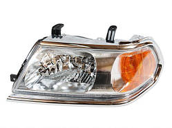 Фара Mitsubishi Pajero Sport '00-08 левая (FPS), хром. рант MR566771